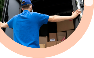 Gain Real-Time Visibility: Male delivery driver in blue uniform using tablet for real-time fleet visibility and route tracking in van sales operations